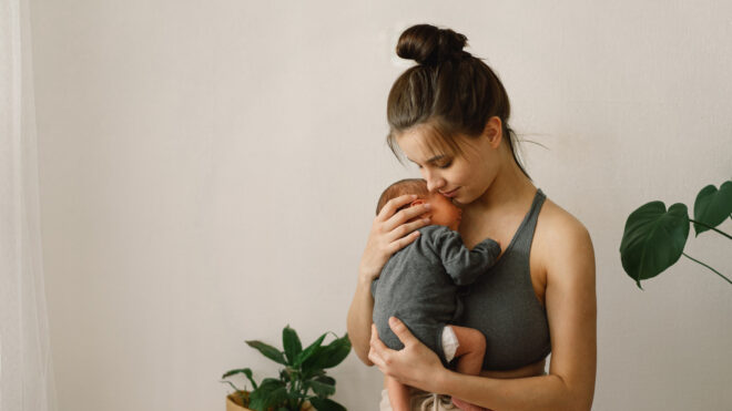 mom holding baby