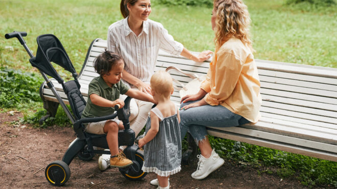 two moms talking