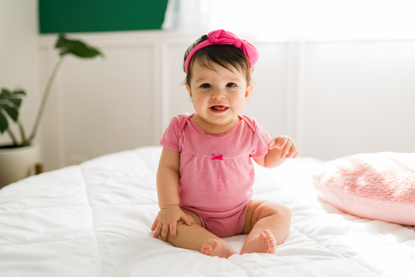 Beautiful baby smiling and making eye contact