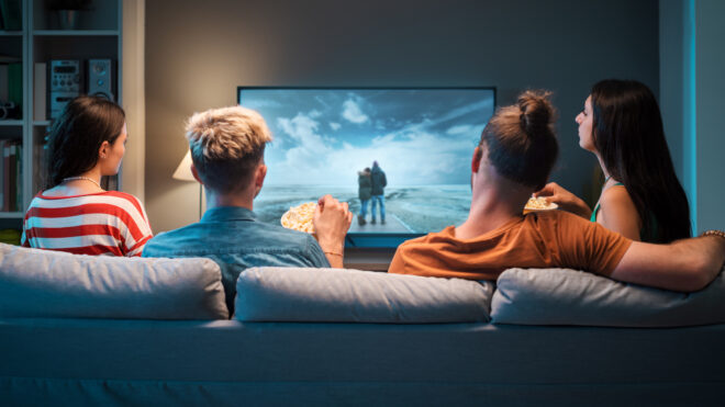 Family watching a movie