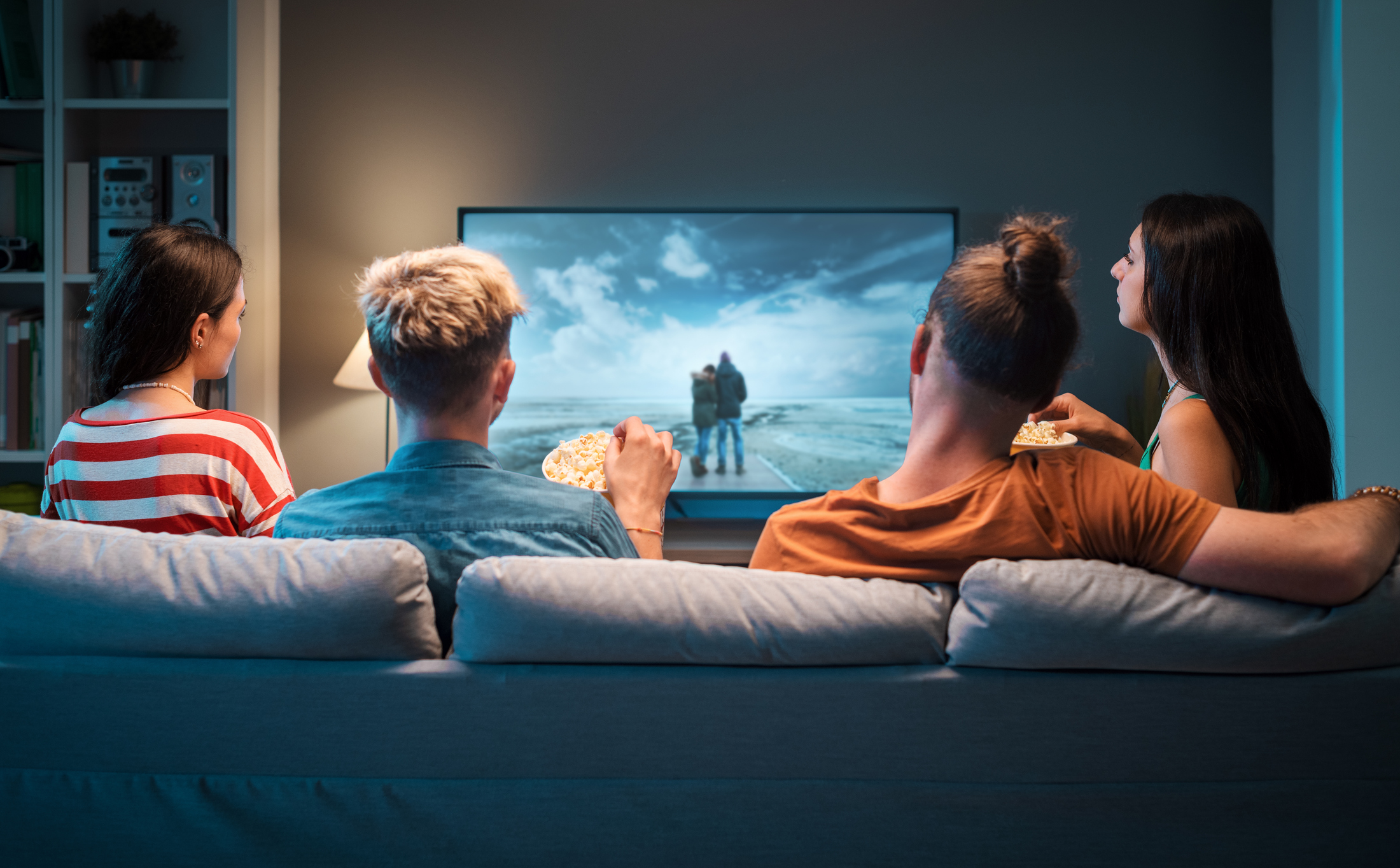 Family watching a movie