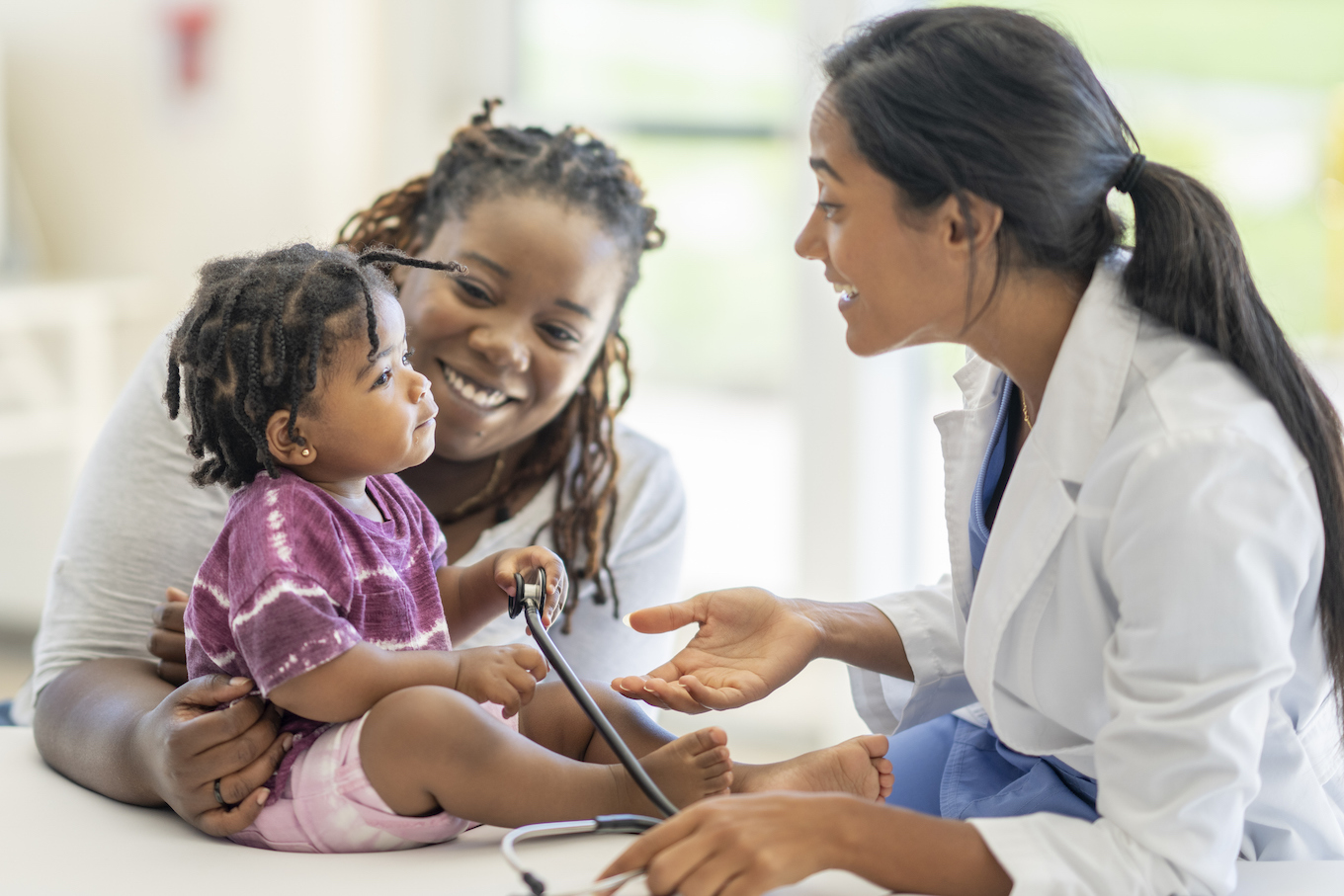 Doctor Meeting with a Mother and Her Son