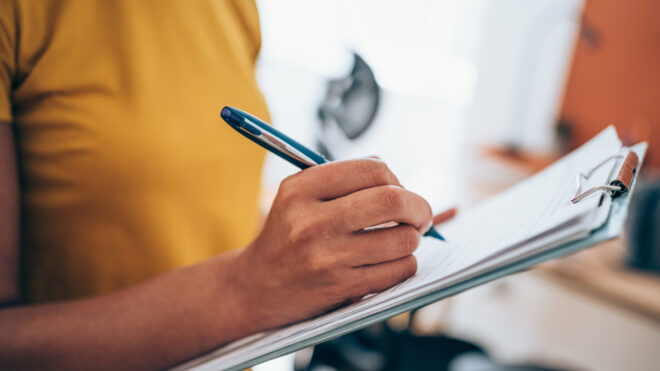 woman signing contract