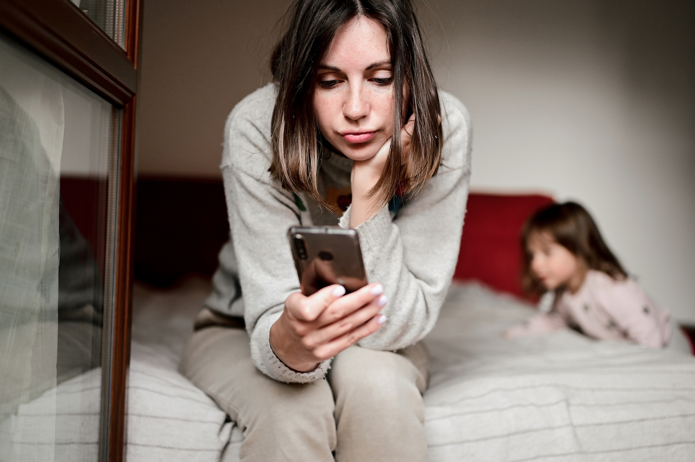 Mom looking at phone