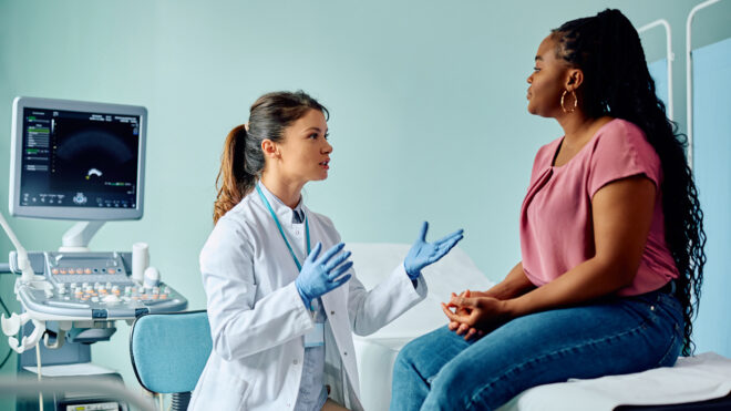 Woman talking to a doctor egg freezing