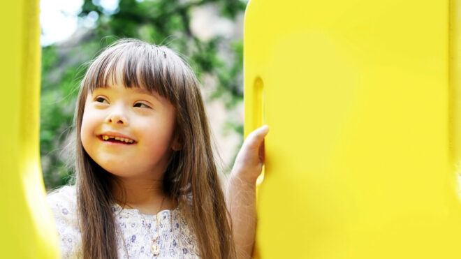 brown haired girl with Down syndrome