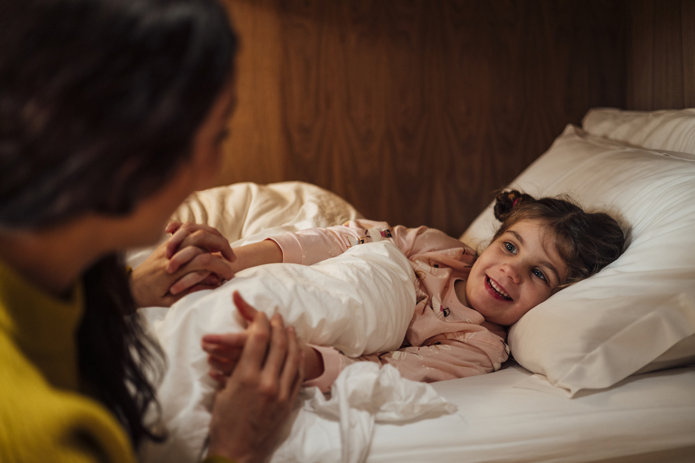 Mother Putting the Little One to Bed
