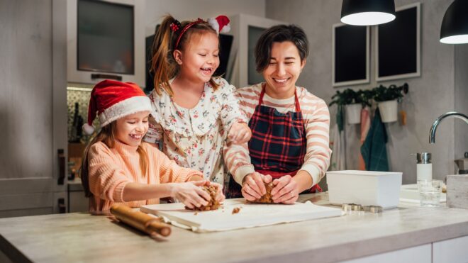 mom and two kids in kitchen
