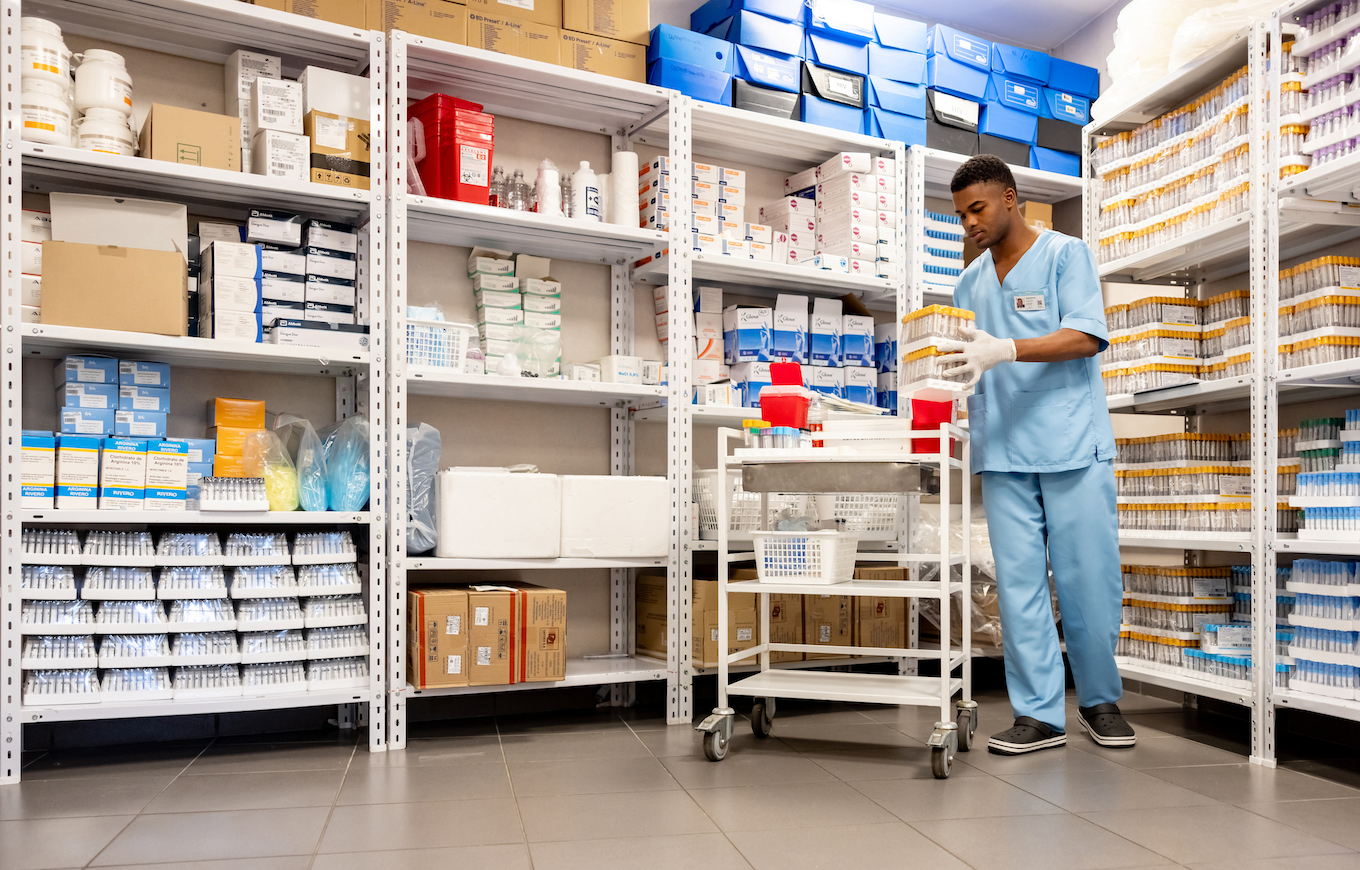 Nurse organizing medical supplies at the hospital laboratory