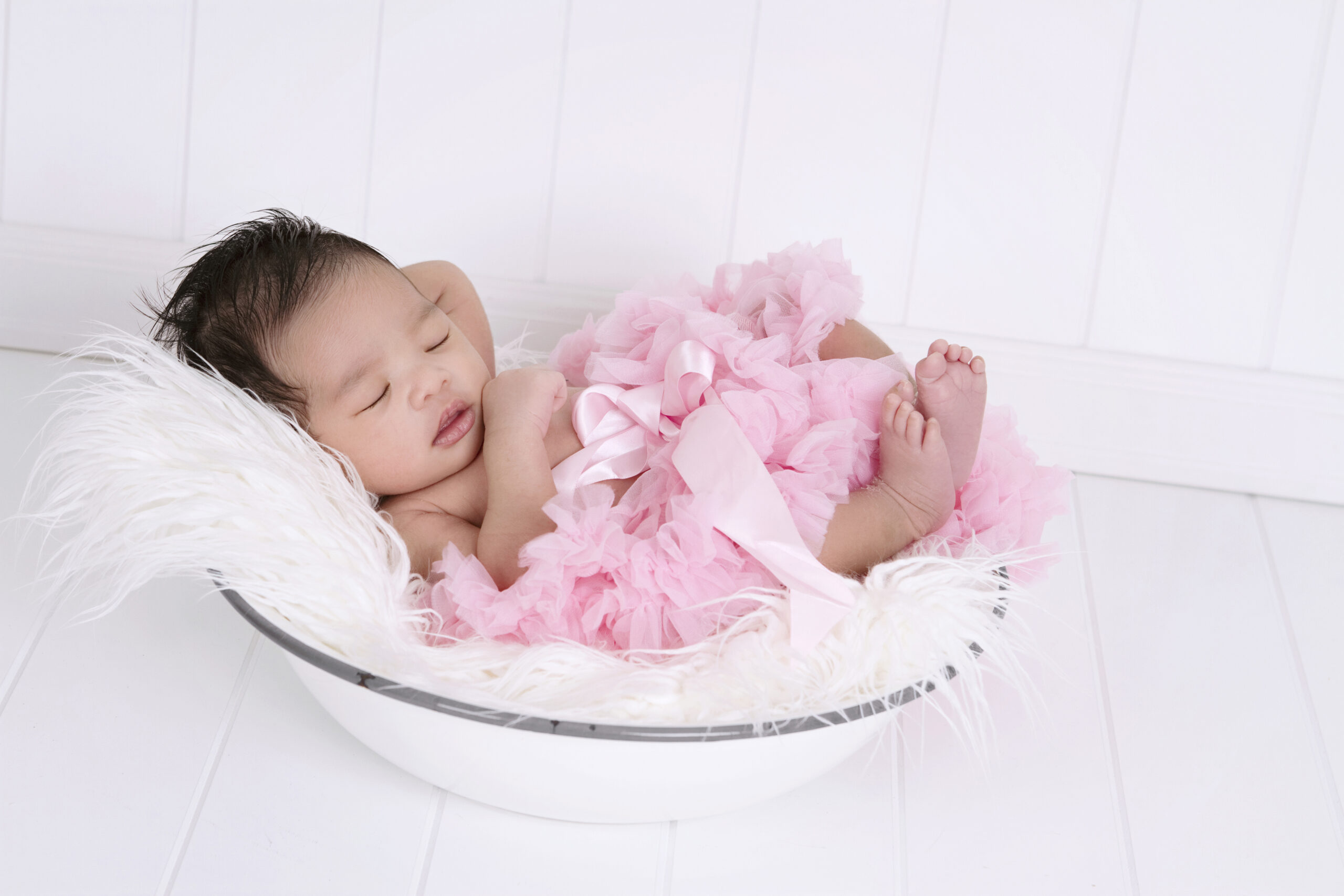 Beautiful Multi Ethnic Newborn Wearing Tutu