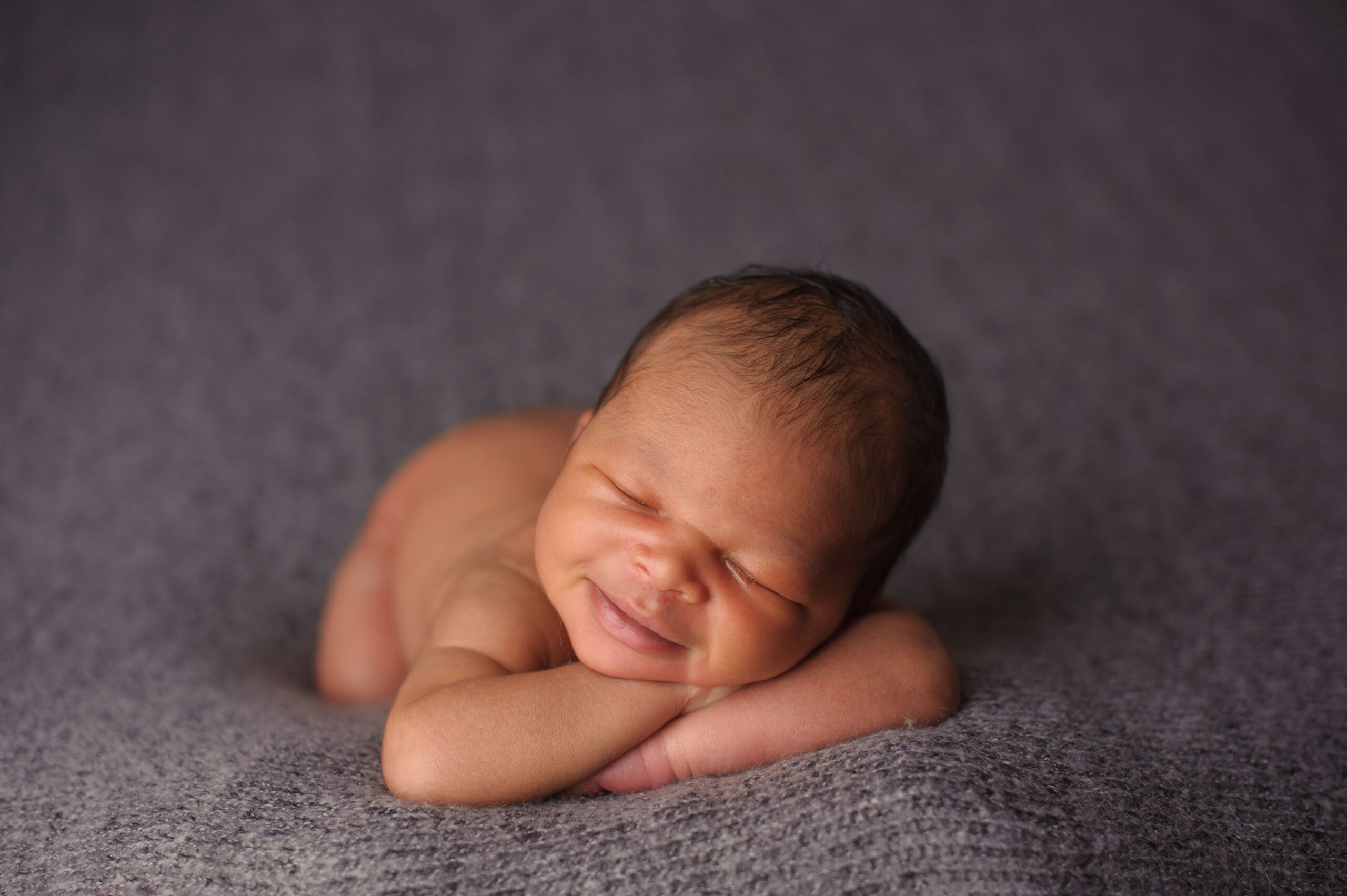 Smiling Newborn Boy