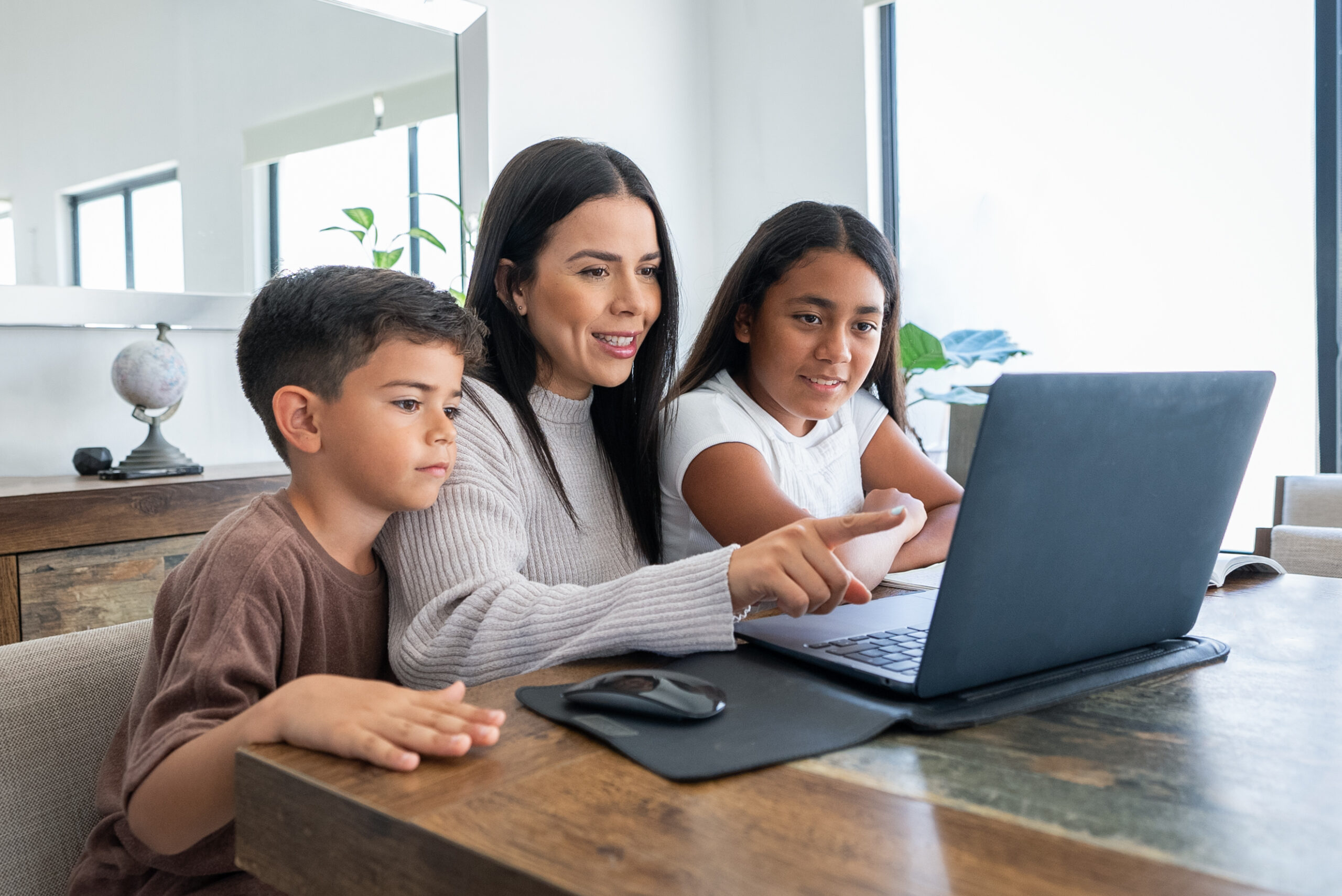 Mexican Family Entertained Using the Laptop, Fun Moment, Modern Life, Technology