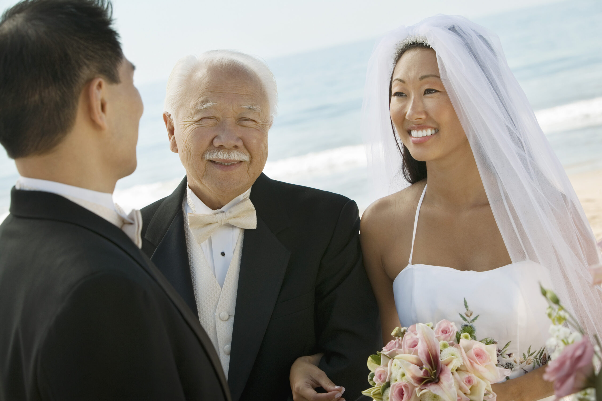 Bride standing with groom