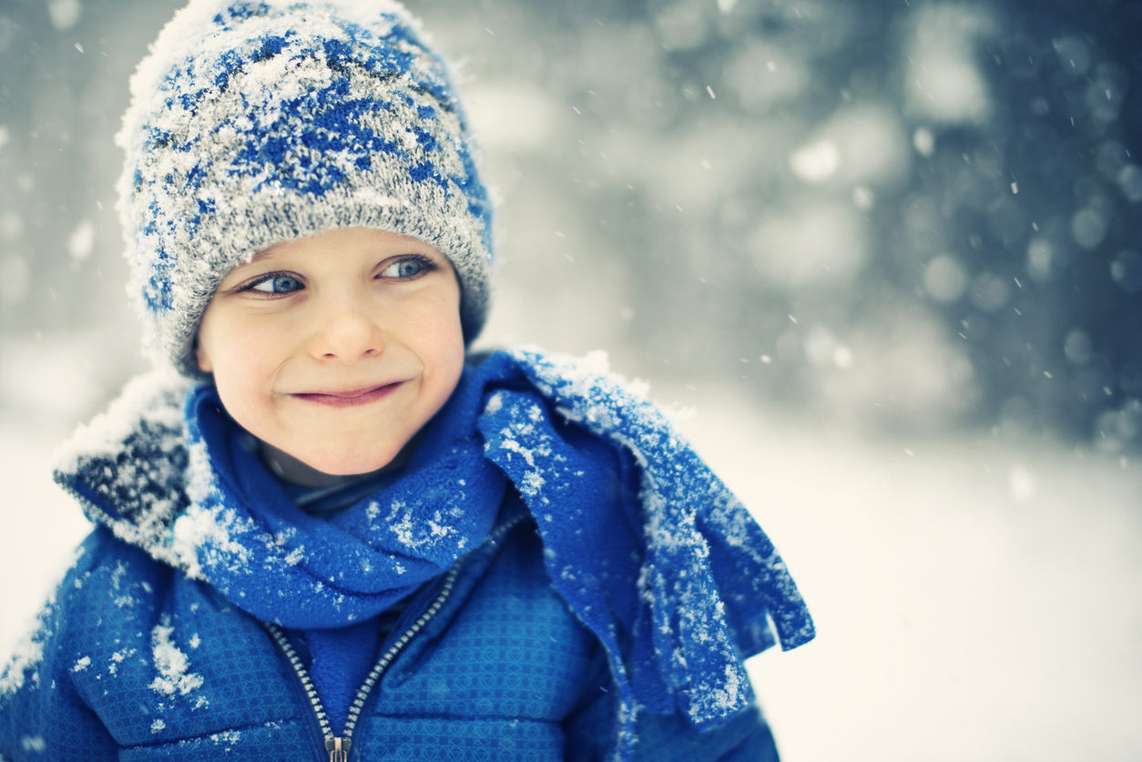 Little boy and the snow