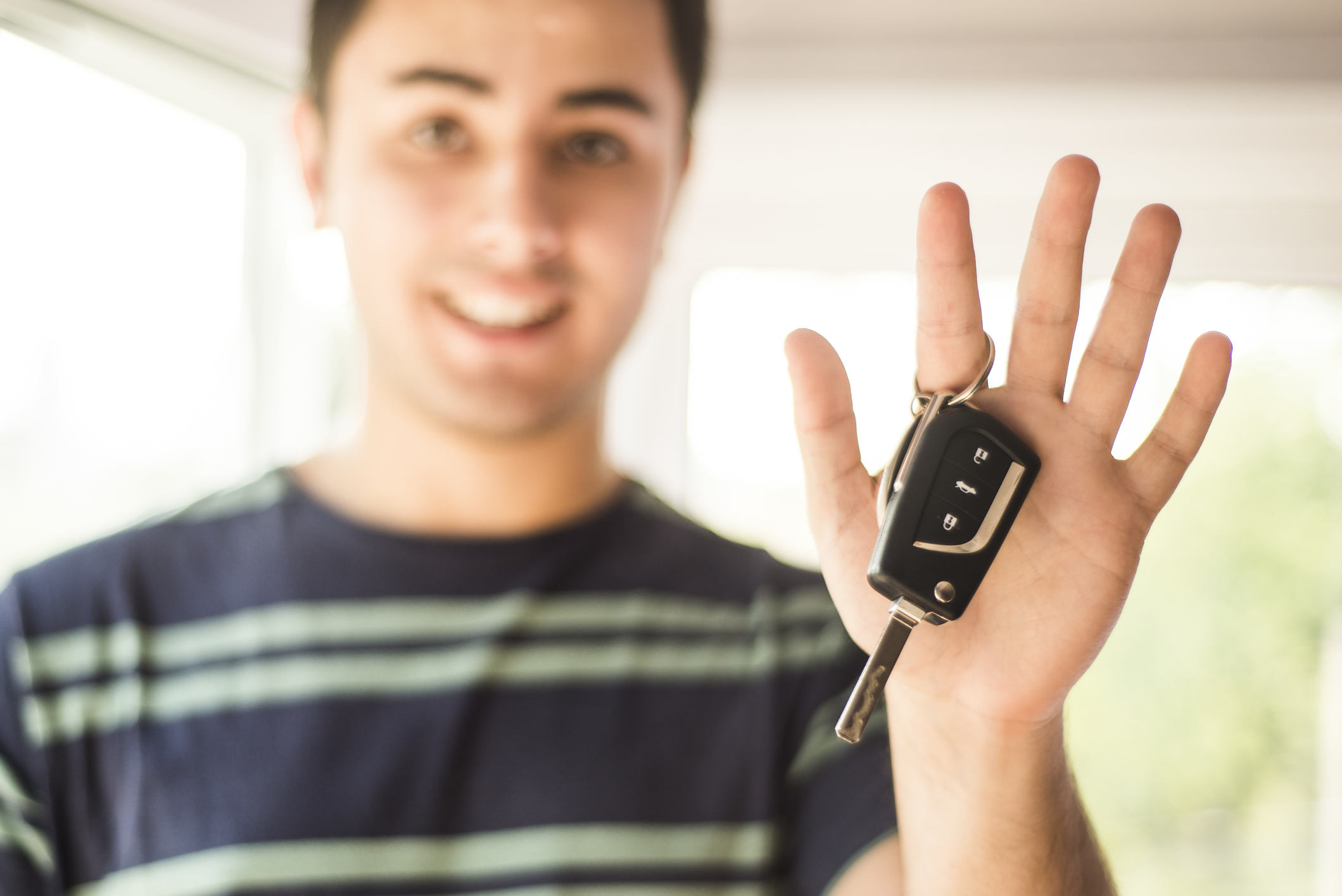 Man holding car keys