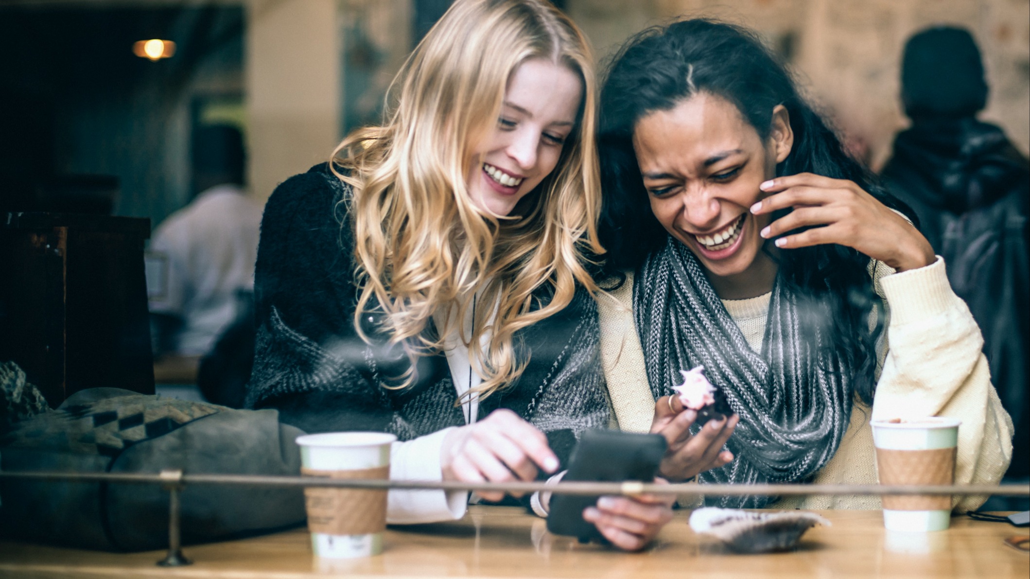 Laughing at phone