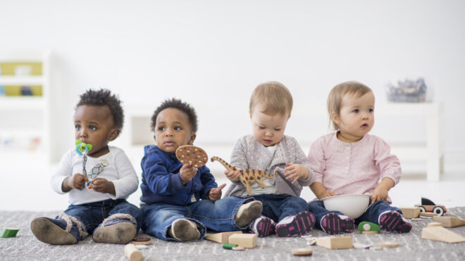 babies playing together