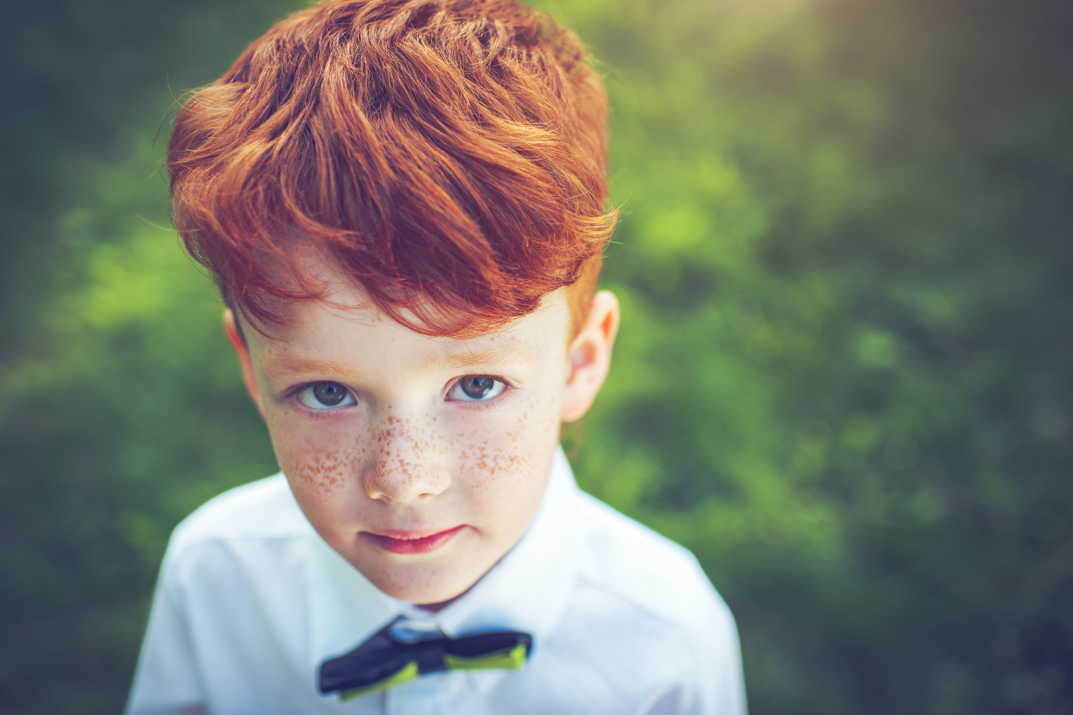 Redhead boy outdoors