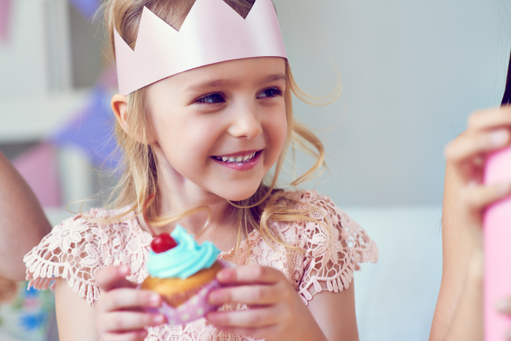 birthday girl eating cupcake