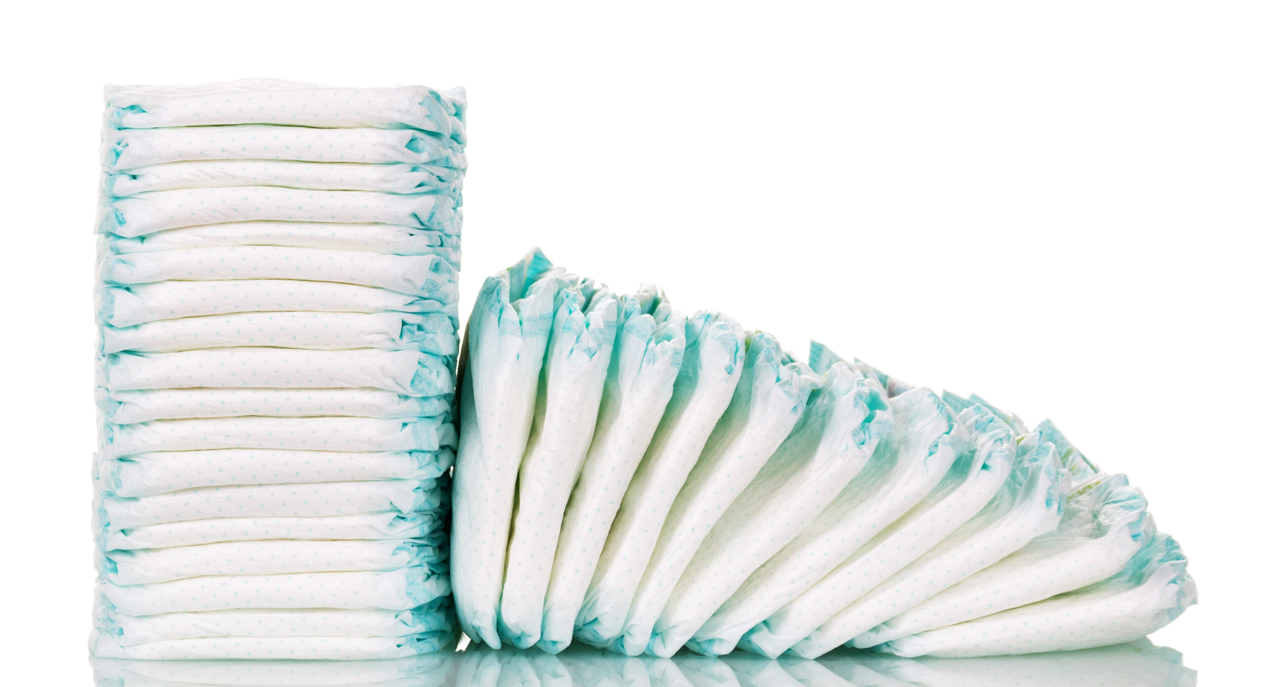 Stacks diapers for children isolated on white background