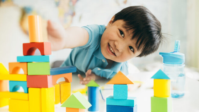 toddler playing with blocks