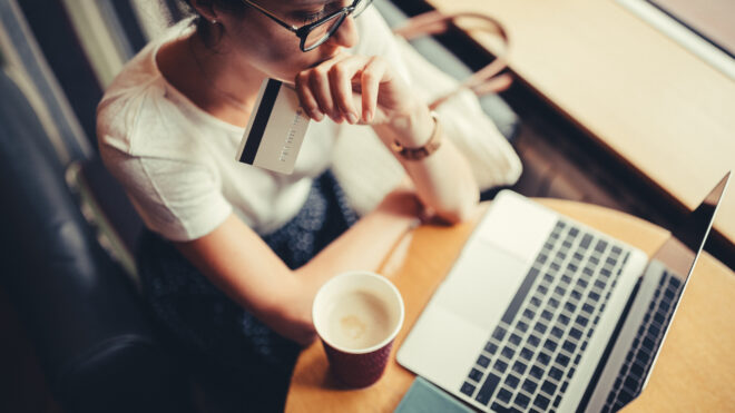 woman looking at laptop