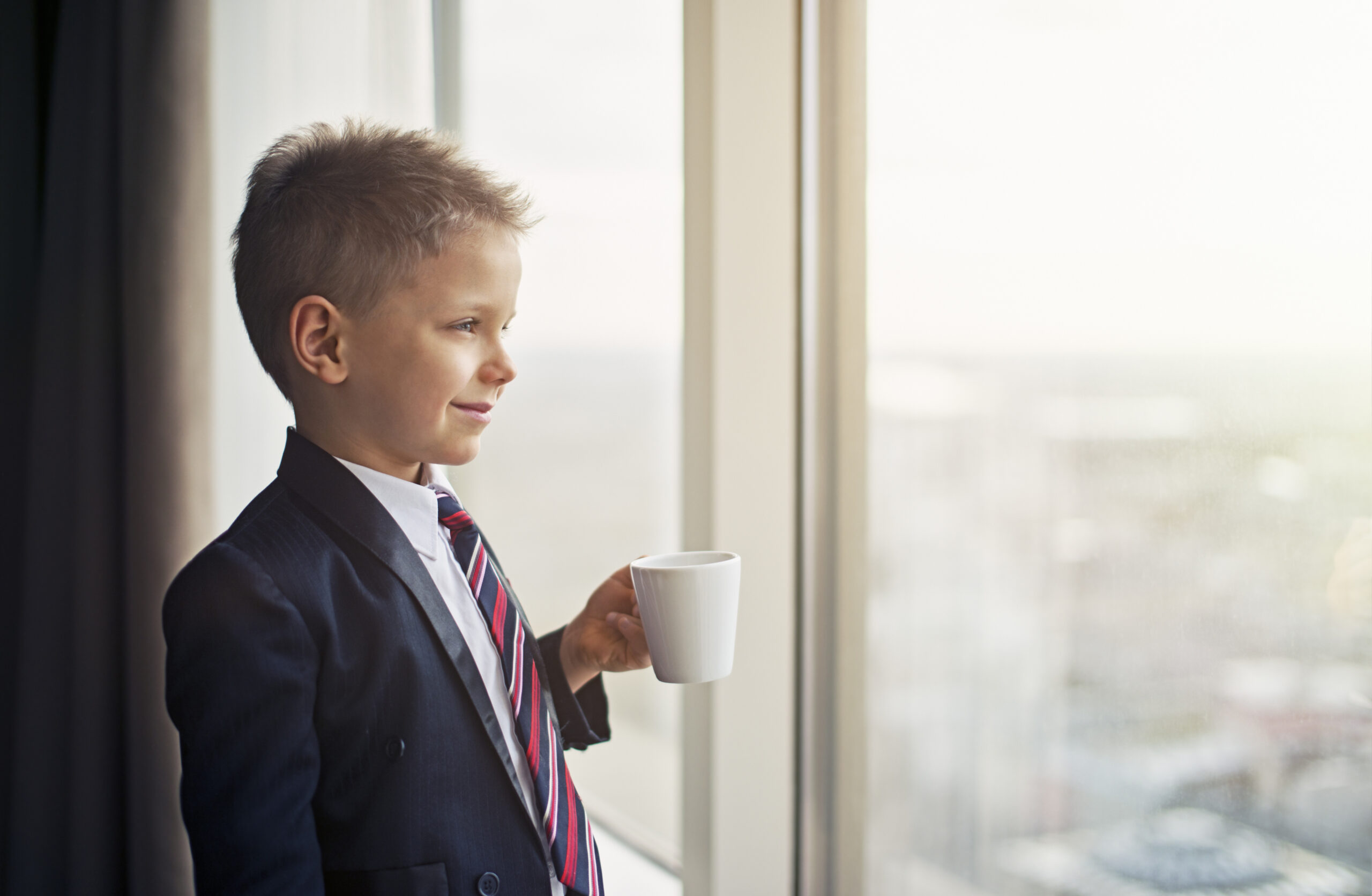 Portrait of a cute little business man