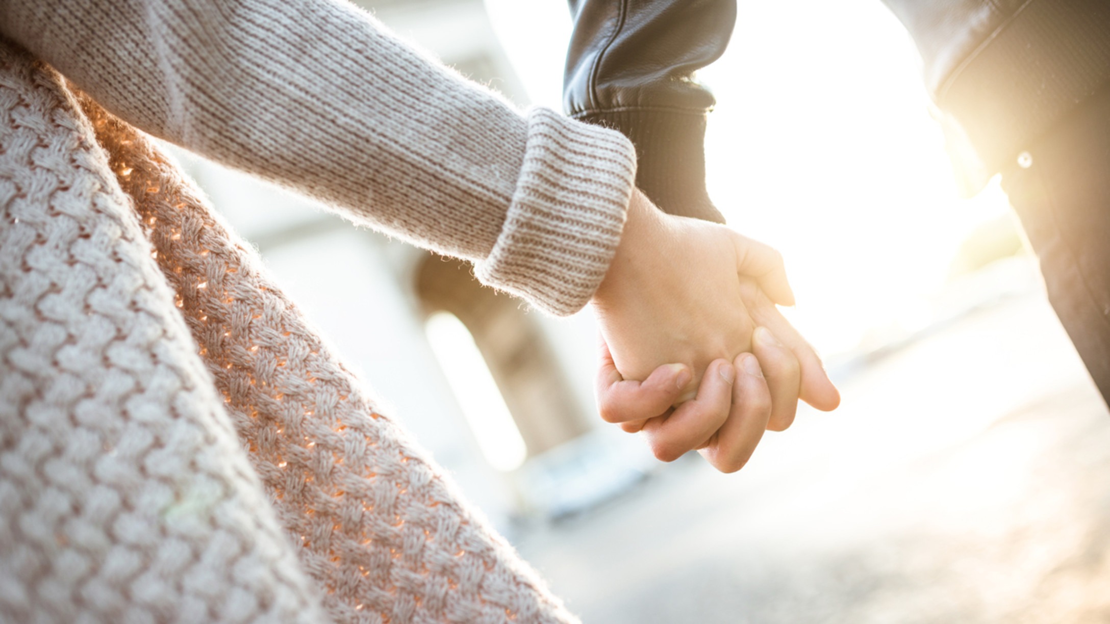 Couple holding hands