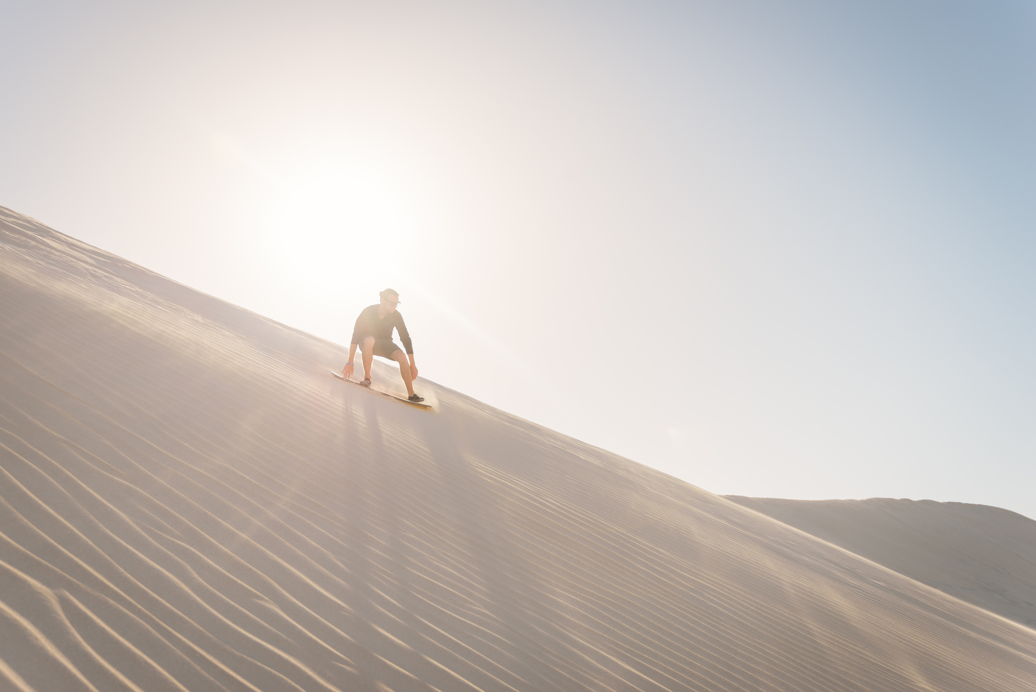 Sunset sand dune boarding