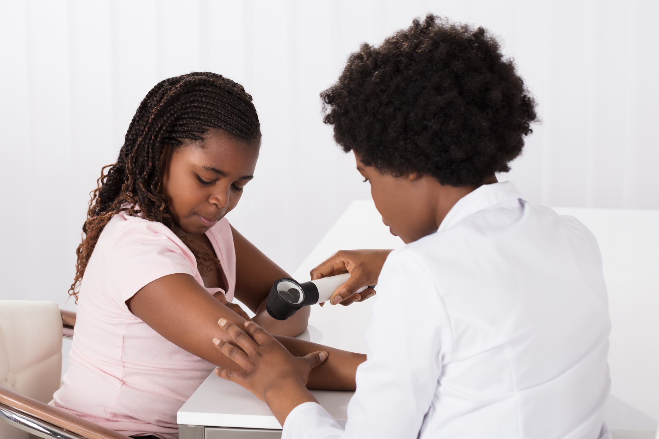 Dermatologist Checking The Child Patient Skin