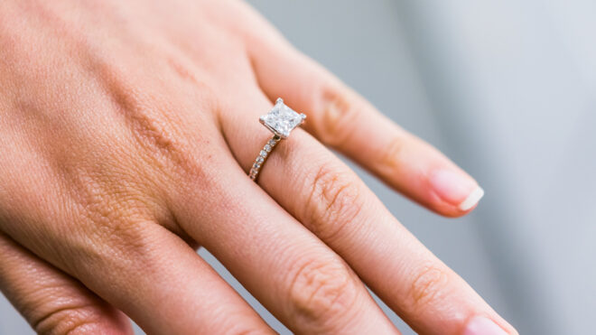 woman wearing engagement ring