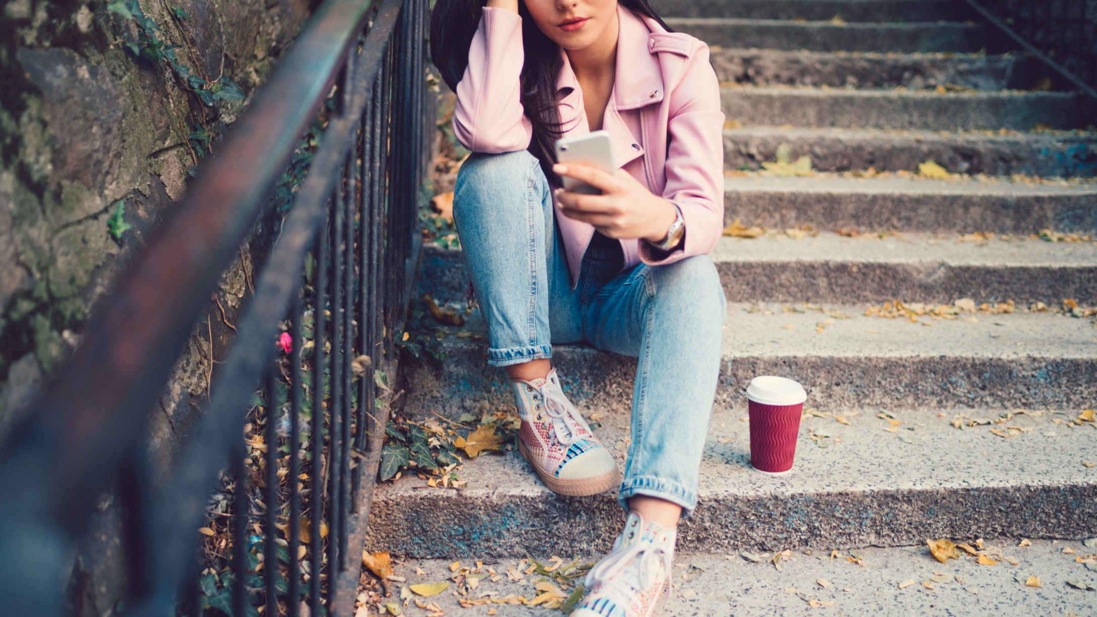 sad teen girl texting