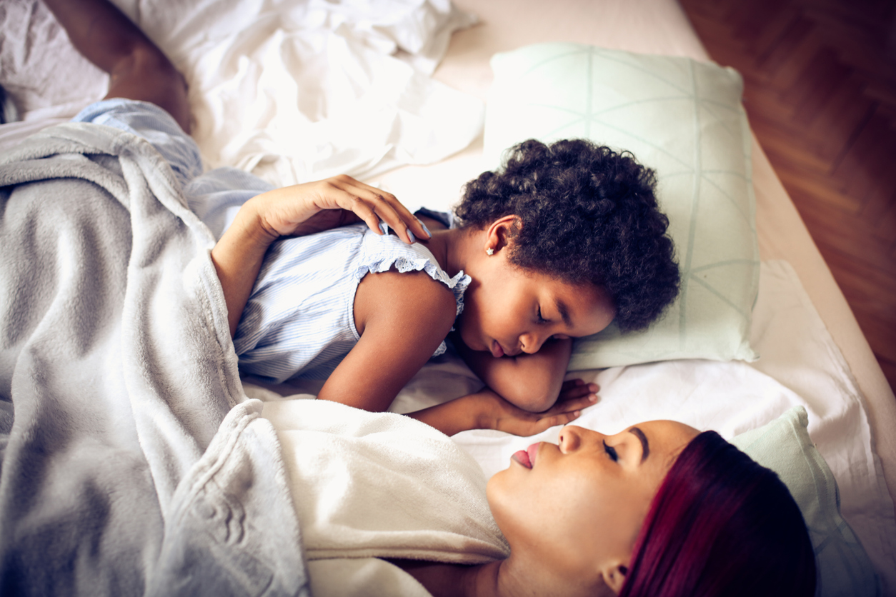 Sleeping together.