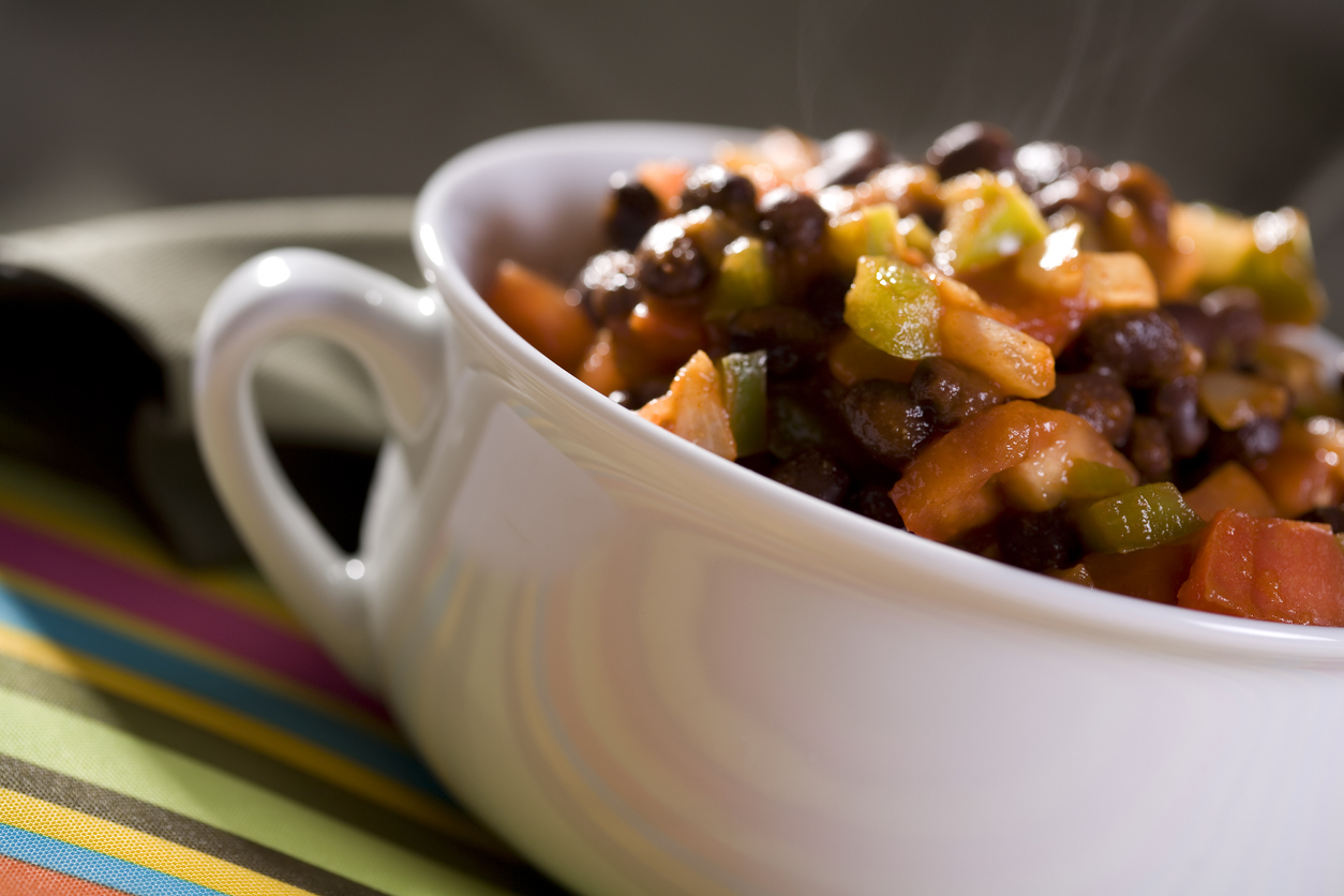 Black bean chili in a white plate