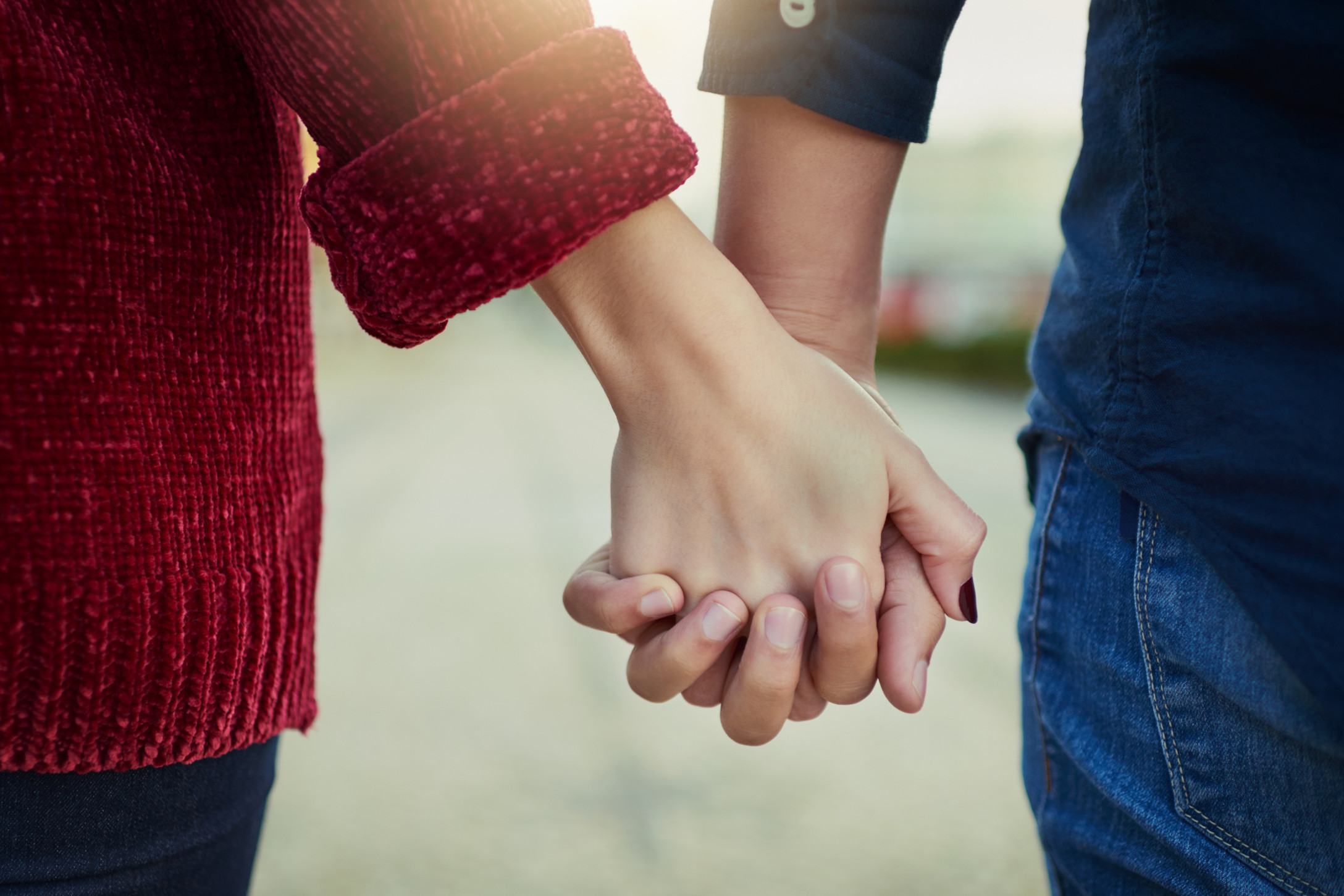 couple holding hands
