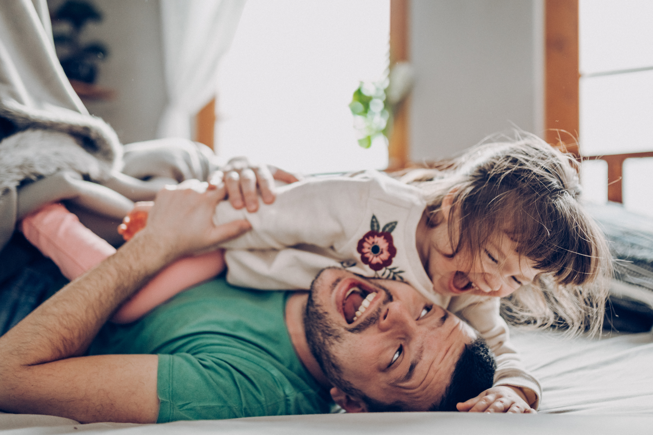 dad playing with daughter