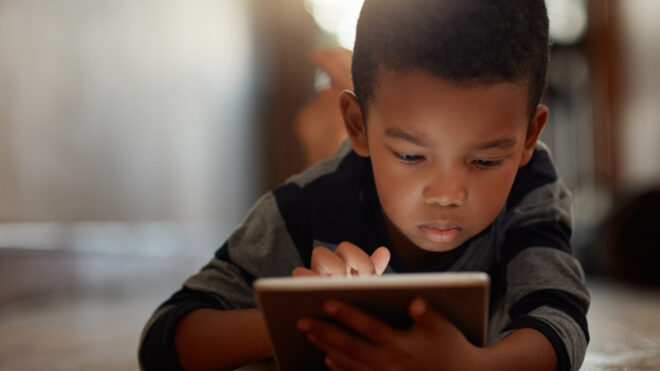 Boy looking at tablet