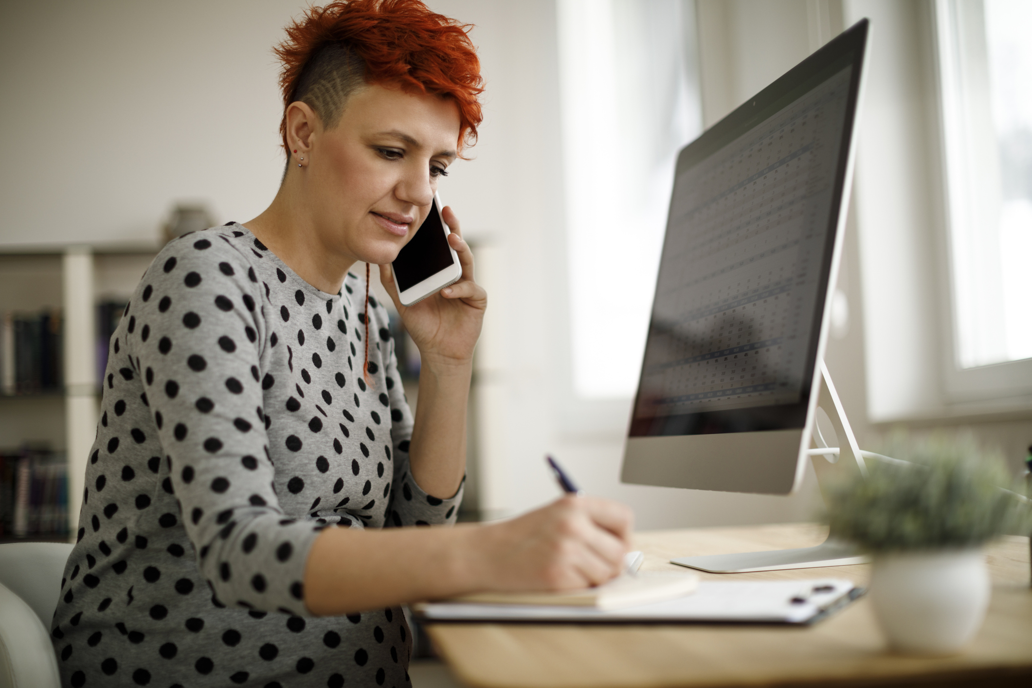 Pregnant woman working from home office