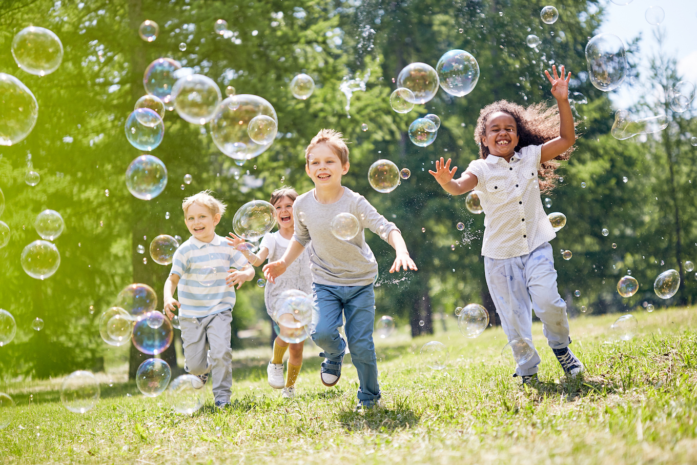 Kids playing with bubbles