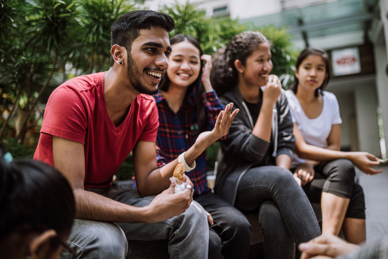 Group Of Students Joking And Getting To Know Each Other