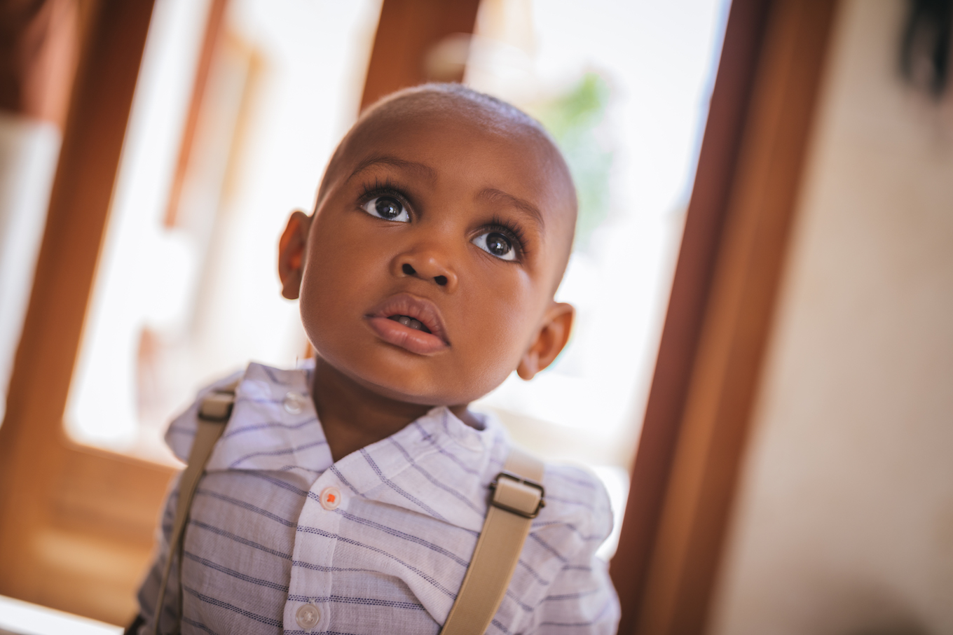 Portrait of cute little baby boy at home