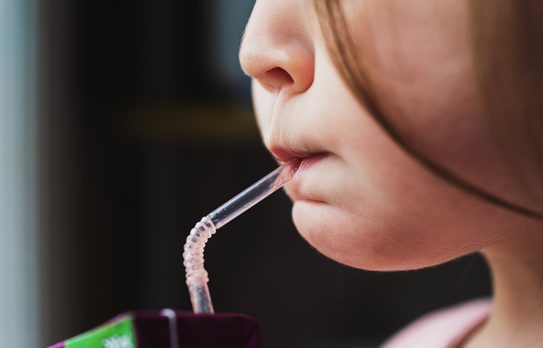 Girl Drinking Juice Box