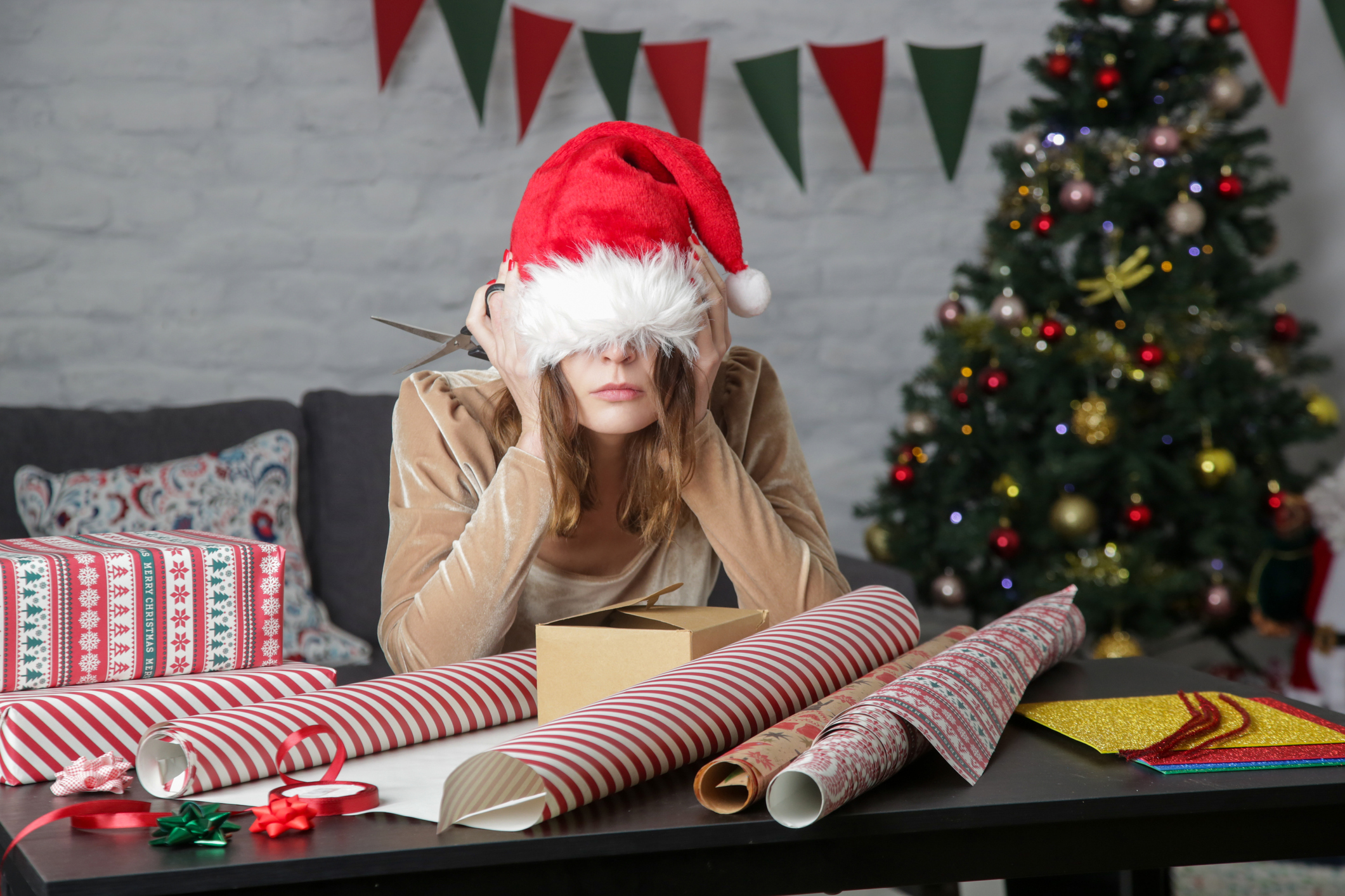 co-parent wearing Santa hat