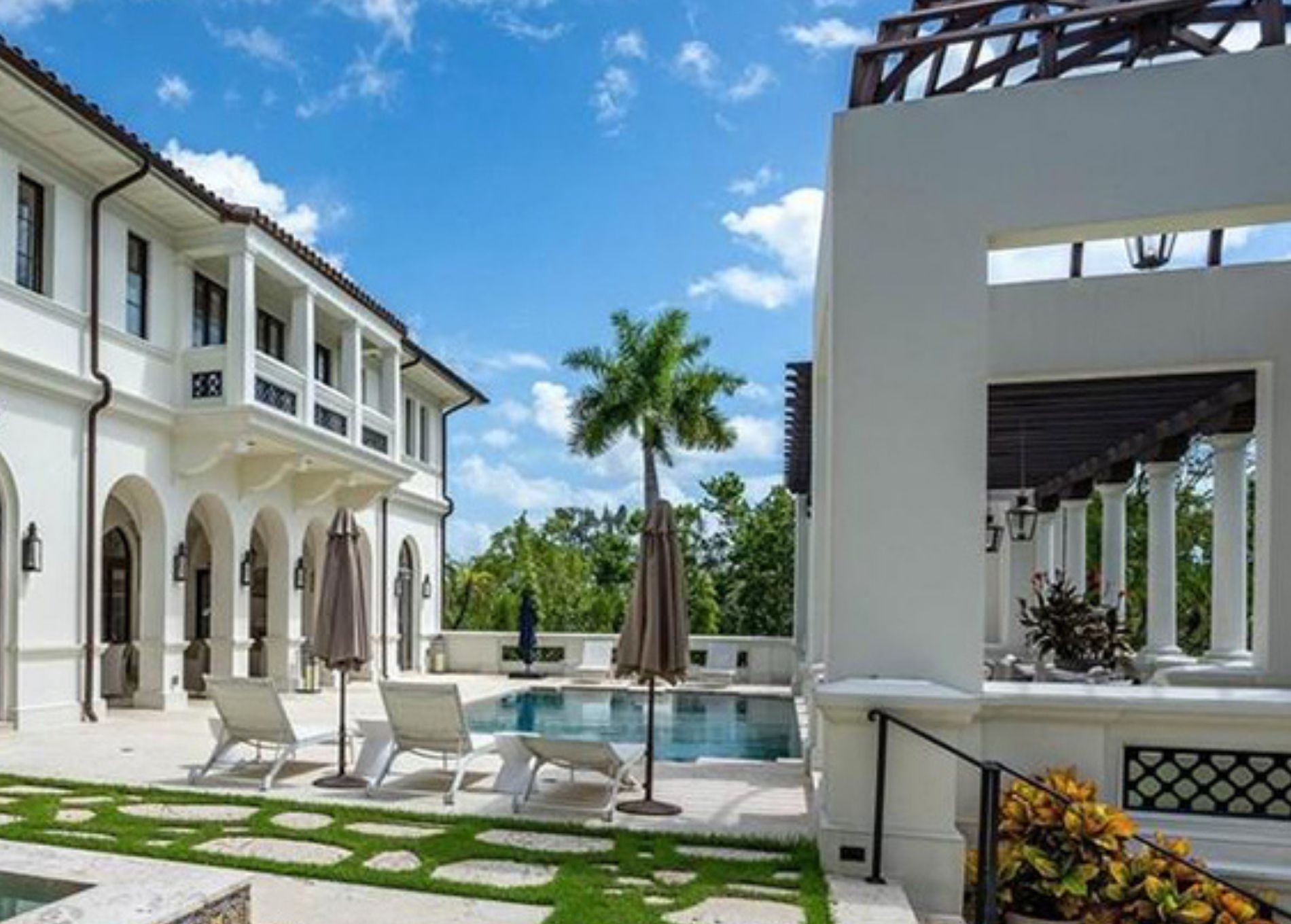marc_anthony_home_pool_lounge.jpg