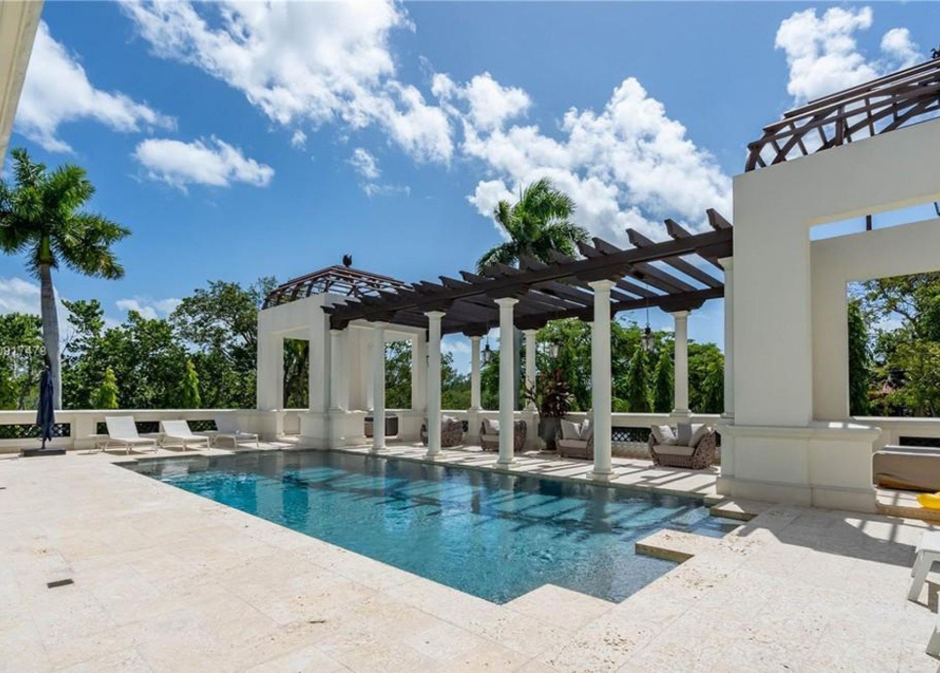 marc_anthony_home_pool_seating.jpg