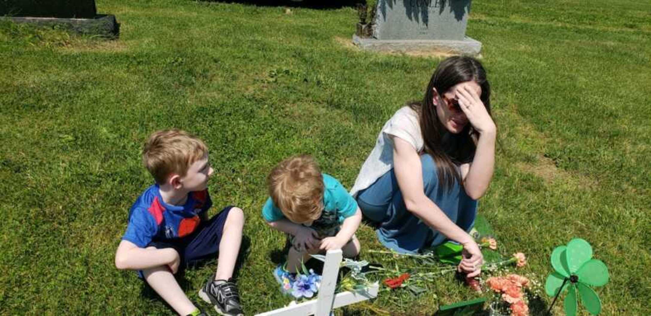 mom-with-children-at-sons-grave-900x438-1.jpeg