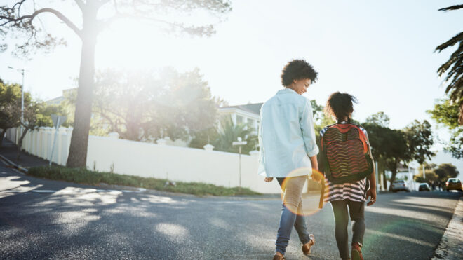 mom and daughter walking