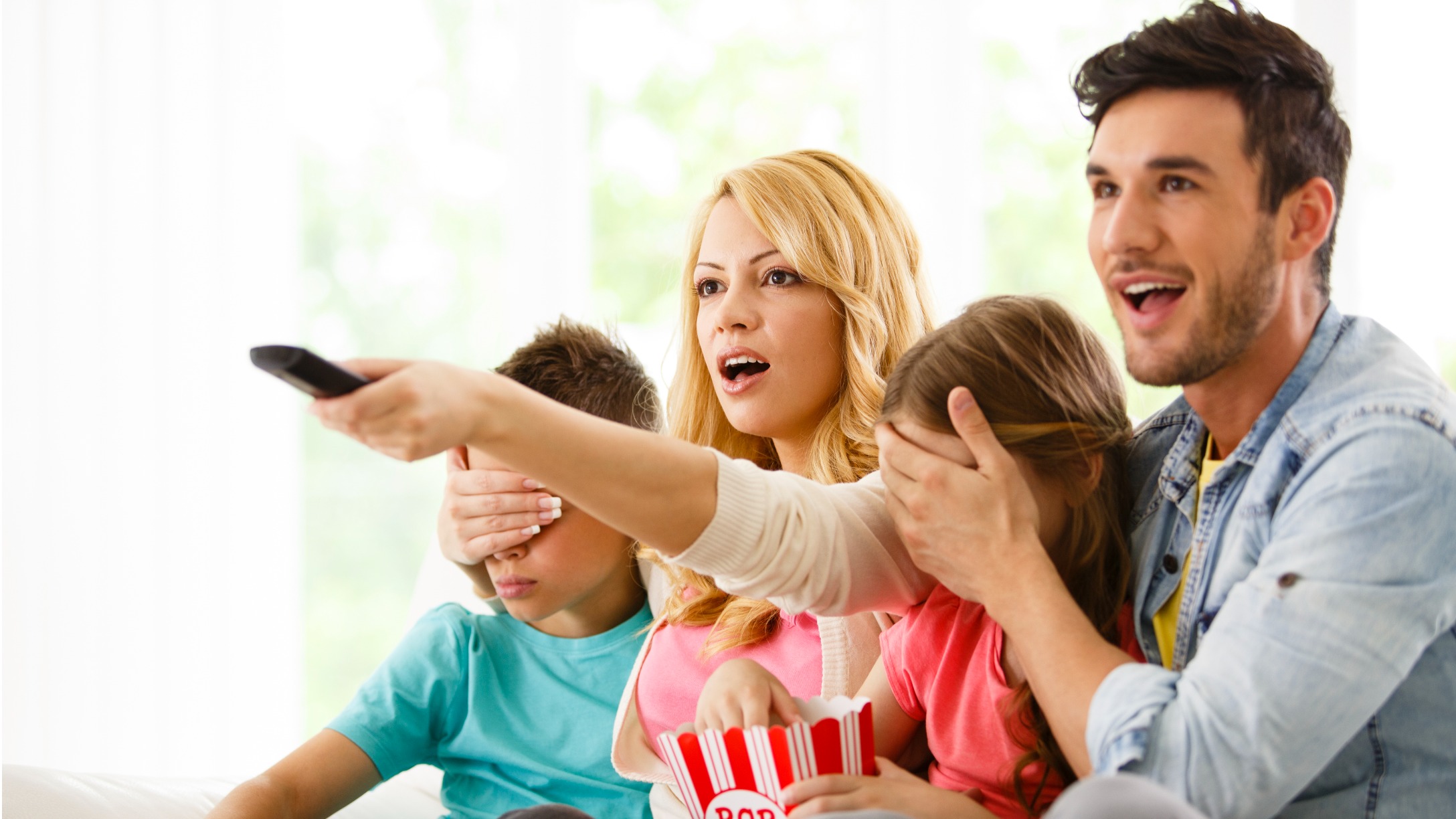 Parents covering kids' eyes