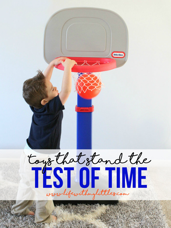 Toddler with Little Tikes basketball