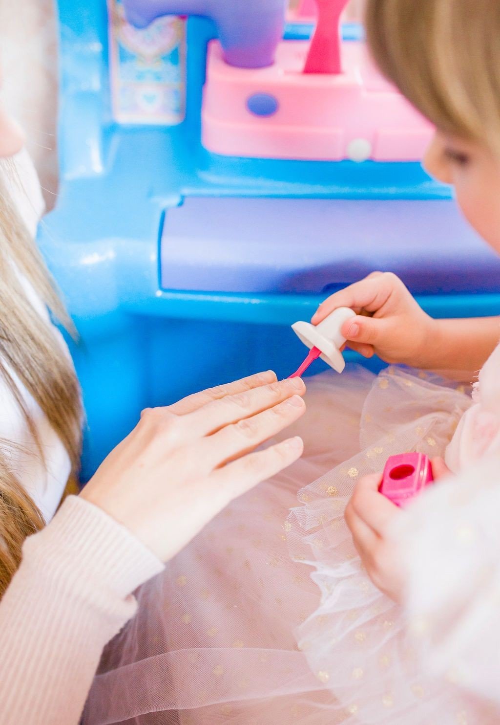 little girl playing pretend with Little Tikes Ice Princess Magic Mirror Set